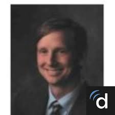 Dr. Clinton E. Curtis, MD