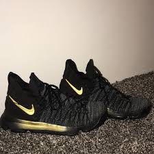 Jordan 6 rings men's • black/university red/dark sulfur $170.00. Nike Shoes Nike Kevin Durant Black Gold Basketball Shoes Poshmark