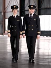 Air Canada Unveils New Paint Scheme Employee Uniforms Pilot Uniform Employee Uniform Uniform