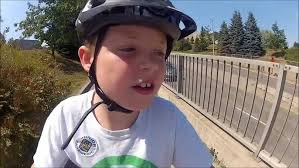 Riding the Schwinn Twinn tandem with my grandson