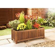 Manufactured by idel from recycled rubberised plastic the pots will last many years. Burntwood Folding Planter This Traditionally Constructed Solid Wood Planter Will Add Charm Character To Any Garden Wood Planters Decorative Planters Planters