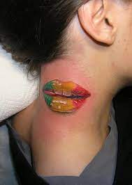 Tattoos By Piotr Dedel Inked Magazine Lip Tattoos Rasta Tattoo Neck Tattoo