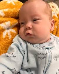 5 months (on the 8th) Leviathan is rolling across the floor, trying to say  Dada, has 2 teeth (almost 3), in 9-12 month clothes, and he loves talking.  He is such an amazing boy 🥰