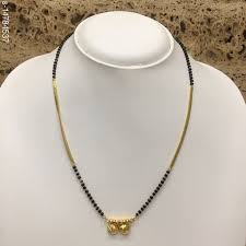 The gold short mangalsutra designs with price are available at cs jewellers. Buy Checkout This Latest Mangalsutras Product Name One Gram Gold Plated Short Mangalsutra Latest Design Tanmaniya Short Gold Chain Black Beads Vati Pendant New Mangalsutra Designs For Women 18 Inches For Rs412 Cod