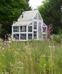12 amazing diy she shed and greenhouse ideas: Greenhouses From Old Windows And Doors Insteading