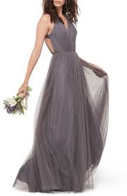 Gathered Straps Span The Open Back Of An Alluring Airy Gown Fashioned From Layered Bobbinet With A Fla Womens Bridesmaid Dresses Tulle Bridesmaid Dress Gowns