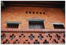紅磚堆砌的窗花與門樓 outdoor decor decor outdoor