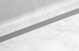 World S Most Beautiful Shower Drain Remodelista Shower Drain Shower Drains Floor Drains