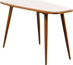 Its organic shape provides a playful approach to versatile function, and will be an instant hit with your guests. Vintage German Kidney Shaped Coffee Table Design Market
