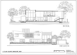 Begin browsing through our home plans to find that perfect plan; This L Shaped Home S Double Height Living Room Opens To The Garden