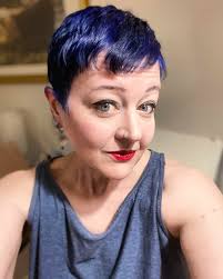 Absolutely psyched about the results of my mental breakdown haircut and  color. I've wanted this blue forEVER. Now I just have to scrub it off my  ears. haircolor