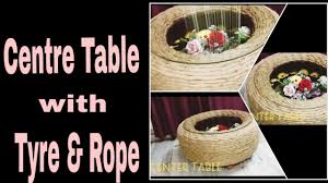 Center the tire on the bottom support, then use adhesive to secure the other piece of plywood to the top of the tire. Centre Table With Tyre Rope Keise Banayi Tyre Or Rope Se Unique Centre Table Dekhia Step By Step Youtube