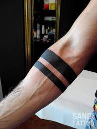 There are also two large wings tattooed behind the skull. Black Lines Tattoo Meaning Novocom Top