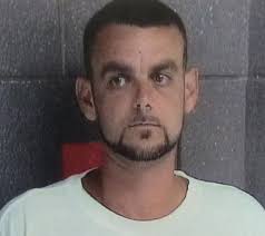 Man shot by police had stolen gun, authorities say