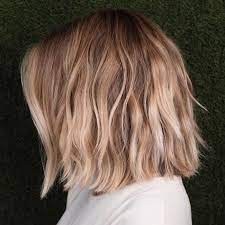 Short To Medium Hairstyles That Ll Freshen Up Your Look Stat Medium Short Hair Medium Short Haircuts Medium Hair Styles
