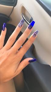 Acrylic nails have been a staple in the beauty industry for years, and this staying power has contributed to their ongoing popularity. Pin By Edyta De On Nails Blue Acrylic Nails Silver Acrylic Nails Blue Nails