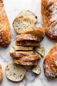 Grab the parchment paper from each end to pick up the dough and transfer it into the pot. Homemade Artisan Bread Recipe Video Sally S Baking Addiction