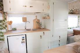 H A P P Y Campers I Get So Many Questions About This Little Kitchen I Love How We Were Able To Keep T Caravan Renovation Caravan Interior Caravan Makeover