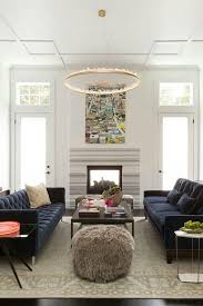 But the navy blue sofa can also be at the heart of the rustic living room in white and wood, shabby chic living space clad entirely in white or even that posh, contemporary home with a sophisticated living space. Navy Sofas Mixed Metals Blue Sofas Living Room Blue Couch Living Room Blue Sofa Living