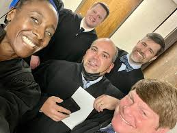 My colleagues and I as we are anxiously anticipating Judge Frederick Adams'  swearing-in ceremony. 👩🏾‍⚖️👨‍⚖️👨🏽‍⚖️👩🏻‍⚖️