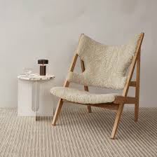 Success spawned variations—there's a penguin lounge, dining chair, and rocker—and then knockoffs; Knitting Lounge Chair By Ib Kofod Larsen Via Menu