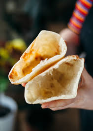 Put in a couple of pizza stones, or 2 large baking trays, to get really hot. How To Make Homemade Pitta Bread So Vegan Pitta Bread Pitta Bread Recipe Strong White Bread Flour