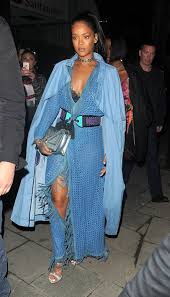 From emerging artist to fearless fashionista, rihanna's had more makeovers rihanna was spotted working her unique style in a bright green silk tracksuit combo that makes us. 24 Times Rihanna Wowed Us With Her Badass Coat Collection Rihanna Street Style Rihanna Style Rihanna Looks