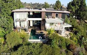 Ashton Kutcher Buys A House In A Gated Community With Mila Kunis House Styles Gated Community Bachelor Pad