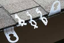 As hanging christmas light clips from gutter guards is not always ideal, we have identified two optimal locations for hanging christmas lights that won't involve putting holes in or changing your gutter covers in any way. Rain Chain Hanging Christmas Lights Christmas Lights Exterior Christmas Lights