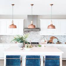 You should also keep them at least one foot from the edge of your counter. 20 Kitchens With The Most Beautiful Pendant Lighting