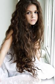 This can be a great way of taming unruly curls too by tying them neatly back away from the face and the eyes. K19 By Yanachu Long Curly Hair Kids Hairstyles Long Hair Styles