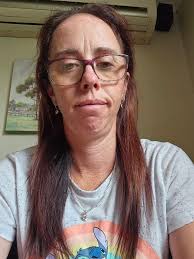 Hi everyone, could someone kindly add dark brown wavy shoulder-length hair  to the person in the first photo, like the girl in the second photo? Thank  you