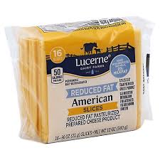 One american cheese slice is around 60 calories, which isn't much in the scheme of things. Lucerne Cheese Slices Pasteurized Prepared American Reduced Fat 16 0 75 Oz Vons