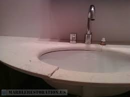 cracked vanity in half hanging on sink