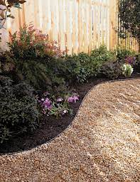 How To Lay A Budget Friendly Gravel Path Gravel Landscaping Backyard Landscaping Garden Walkway