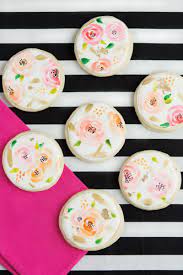 Create watercolor flowers by following this step by step tutorial. Putting On The Glitz Flower Sugar Cookies Wedding Cookies Flower Cookies