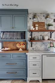 The blue cabinets and kitchen island drawers stand out against the white walls and countertops. Creating Our Dream Kitchen French Country Kitchen Reveal French Blue Cottage