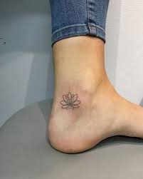 By Michelle Santana Done At Sacred Tattoo Manhattan Small Lotus Tattoo Flower Tattoo On Ankle Cute Ankle Tattoos