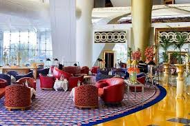 The outside of burj al arab sailboat hotel is just as stunning as the inside. Afternoon Tea At Sahn Eddar Lobby Lounge In Burj Al Arab 2021 Dubai