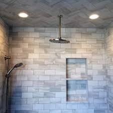 The same color gives the impression that the inclined wall is actually part of the ceiling. Shower Ceiling Lights Swasstech