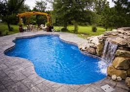 13 Ways An In Ground Pool Will Make You Happier Than These Purchases Pool Landscaping Saltwater Pool Fiberglass Pools