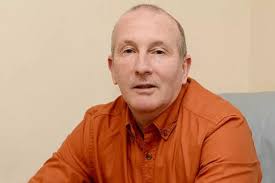 Clarke Carlisle to pay up to £100k compensation to lorry driver traumatised  after his suicide bid