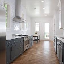 Coordinating kitchen cabinets and flooring requires working with the hue and tones of each hardwood, according to hardwood bargains.when searching out the right wood stain for the cabinets or shade of the tree species you want to use for the flooring, you should take a sample of the wood, which are often available at the store. Grey Kitchen Cabinets With Dark Wood Floors Novocom Top
