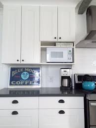 Hack Of Usual Ikea Approach To Microwave Cabinetry For Our Tiny Kitchen With Matching Tiny Microwave We Used A 12 De Tiny Kitchen Kitchen Kitchen Cabinets
