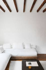 Minimalist trendy living room inside ornament. Minimalist Living Room Designs With White Color And Wooden Accent Decor Nkdesigns Net