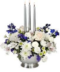 Flax — a flowering plant used to procure flax oil for greasing certain cloths, such as ship sails designed to let as little air through them as possible.35. Silver Elegance Centerpiece In Greenfield Ma Floral Affairs