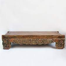 There is a thin but strong border at the sides of the center table with very fine hand carved top and side legs. Vintage Hand Carved Teak Balinese Bench Great Used As A Unique Coffee Table In Colonial Furniture Indonesia Colonial Furniture Colonial Furniture Colonial Furniture Manufacturer
