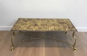 Check out our gold coffee table selection for the very best in unique or custom, handmade pieces from our coffee & end tables shops. French Neoclassical Style Brass Coffee Table With Dolphins And Gold On Glass Top From Maison Jansen 1940s For Sale At Pamono