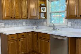 White kitchen cabinet black granite countertop island. Updating Wood Kitchen Cabinets Love Remodeled