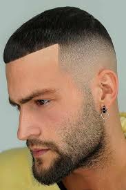 The heavy top layers fall into a rounder shape while the bangs almost halve the vertical length making the face and chin appear shorter and more balanced. Mens Haircuts And Styles For Every Face Shape Menshaicuts Com